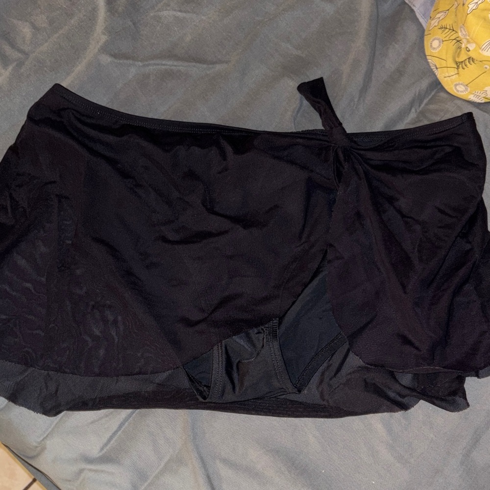 Black bikini bottom with attached mesh skirt